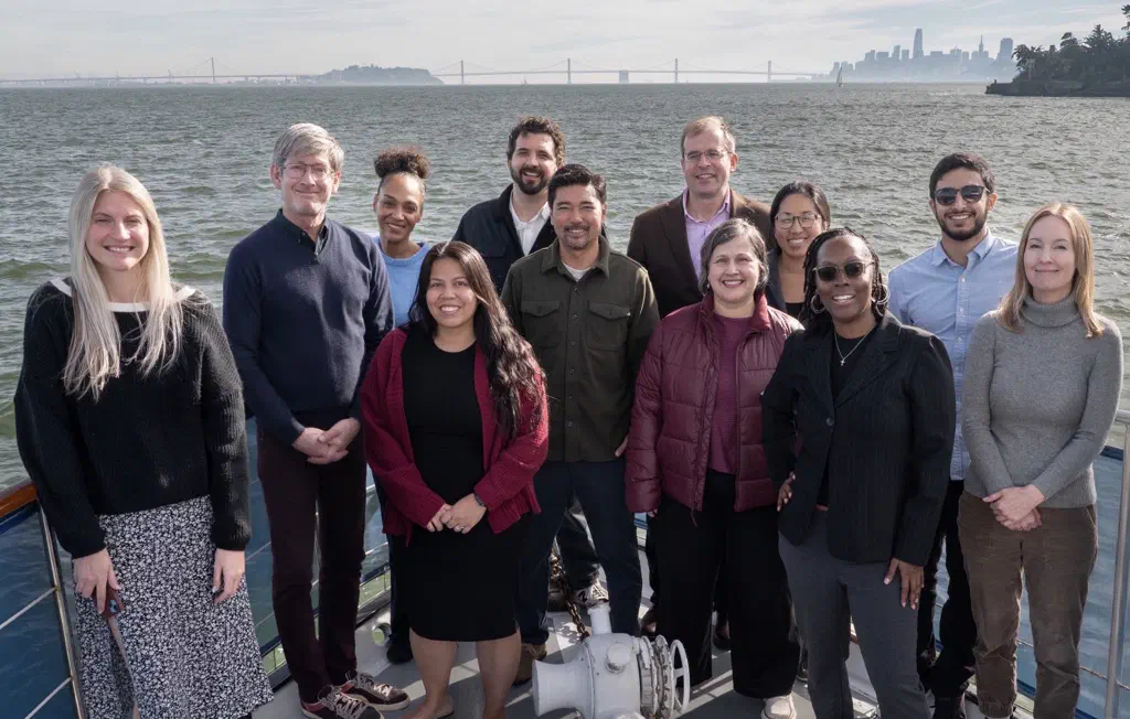 The Crosby & Kaneda CPAs team on a boat on San Francisco Bay